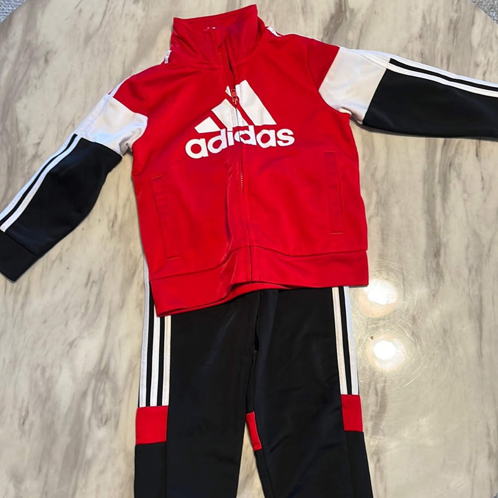 24m Adidas track suit.